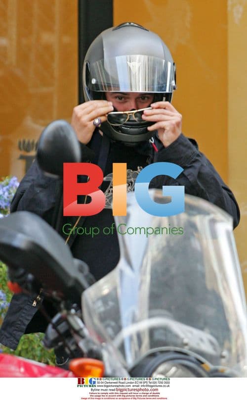 Miranda Kerr leaving apartment with pet Yorkie