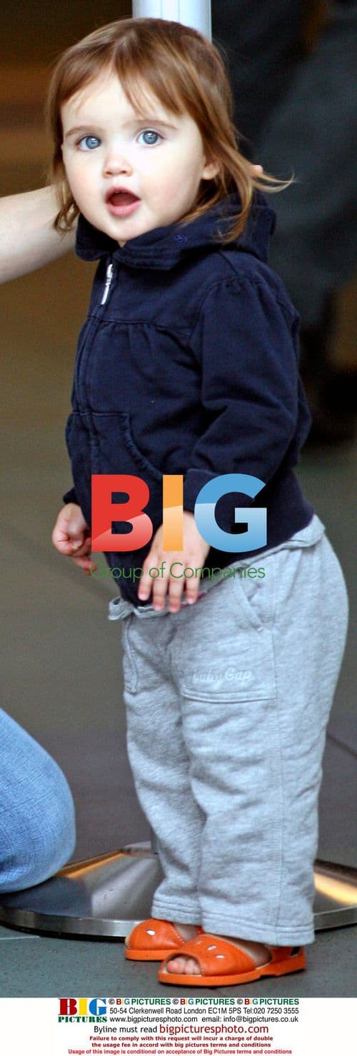 Amanda Peet, David Benioff and baby Frances arrive in Vancouver