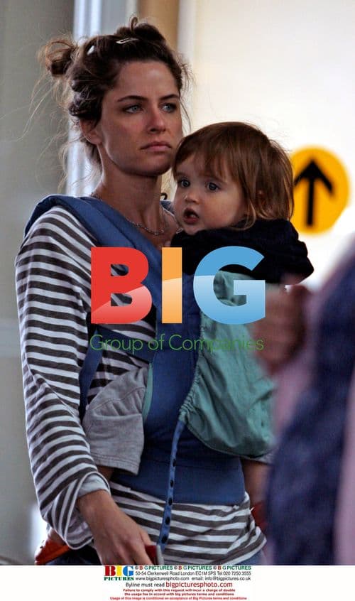 Amanda Peet and family at Vancouver Airport