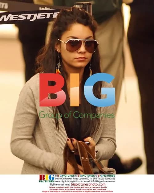 Vanessa Hudgens arrives makeup-free at YVR Airport