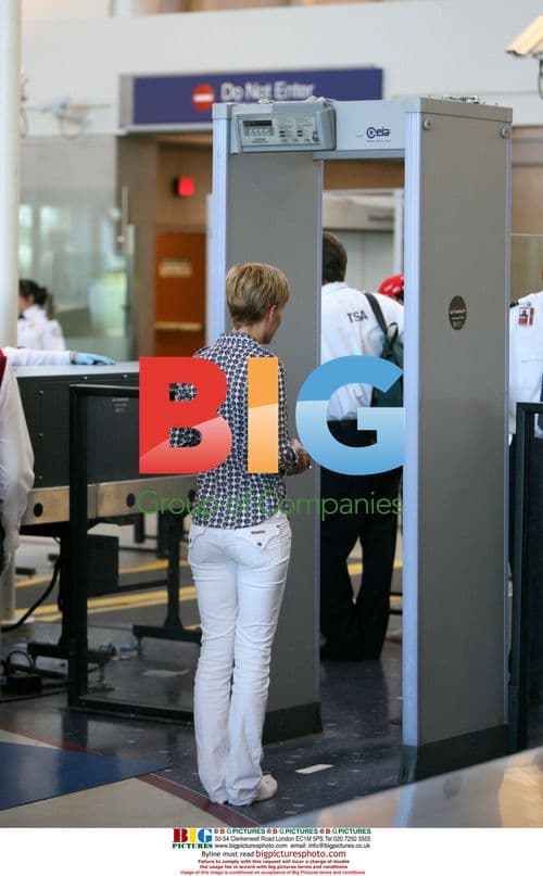 Hillary Swank and John Campisi depart LAX