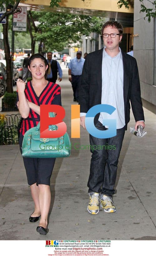 Rainn Wilson strolls with woman