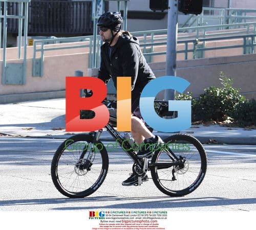 Russell Crowe rides bike around Beverly Hills