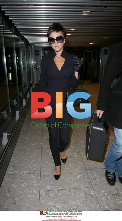 Victoria Beckham departs Heathrow