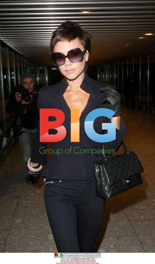 Victoria Beckham departs Heathrow