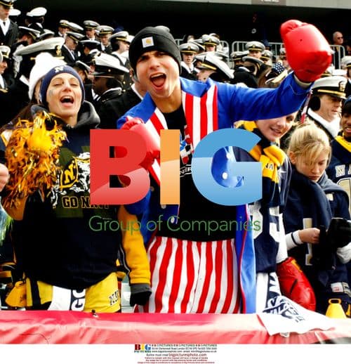 Navy fan cheers at Army-Navy game