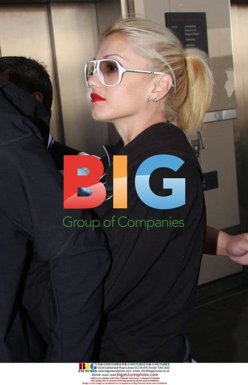 Gwen Stefani and Family Mobbed by Paparazzi