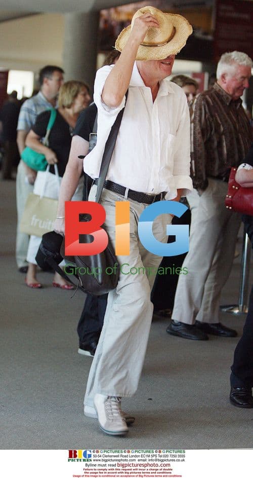 Geoffery Rush arrives at Perth Airport