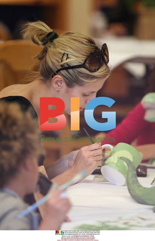 Heidi Klum and family at Colour Me Mine shop