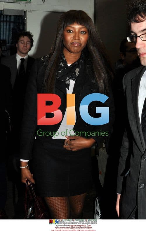 Naomi Campbell leaves hotel with boyfriend