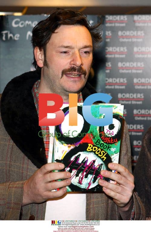 "The Mighty Boosh" stars sign books
