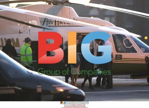 Victoria Beckham Arrives by Helicopter in London