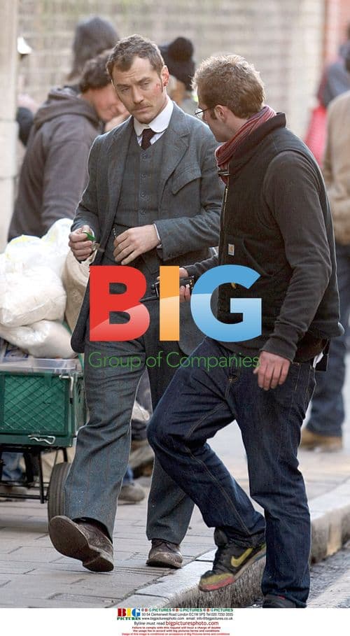 Sherlock Holmes cast on London set