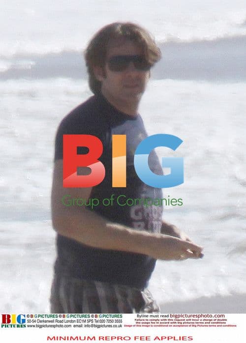 Jonathan Ross Relaxes on Beach