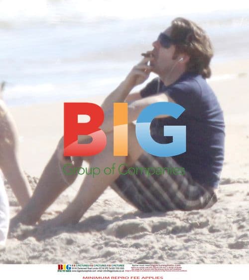 Jonathan Ross Relaxes on Beach