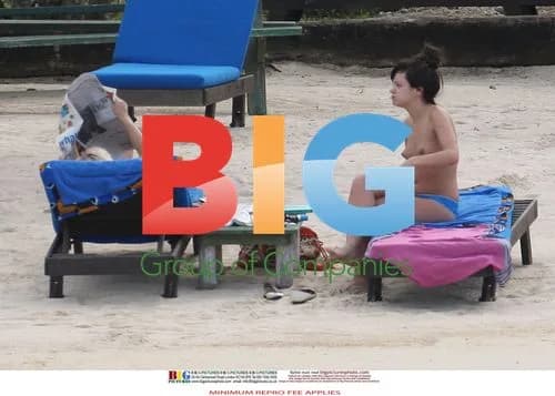 Lily Allen on Caribbean beach