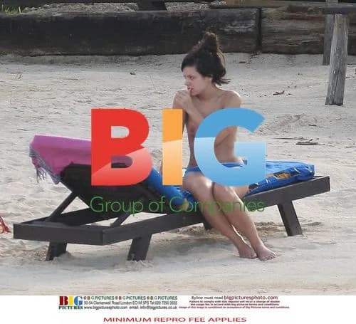 Lily Allen Relaxes on Beach