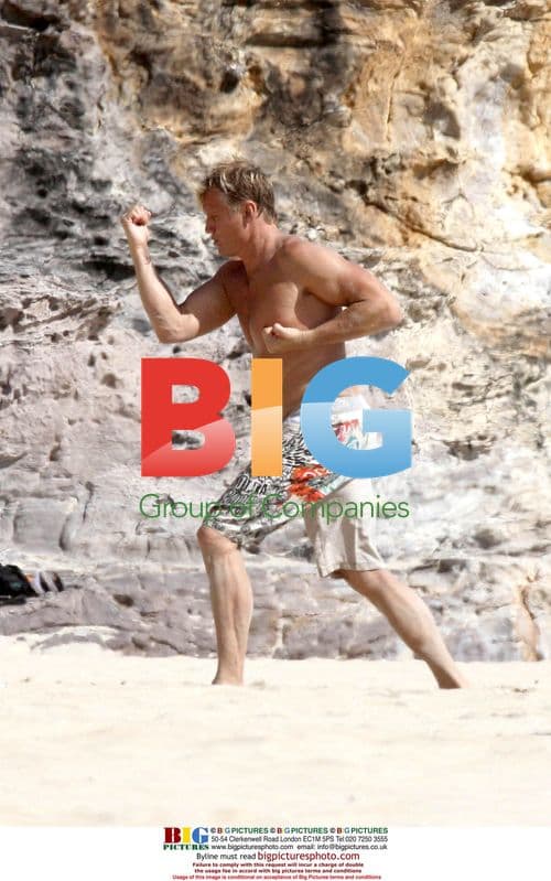 Dolph Lundgren shows karate moves to daughter