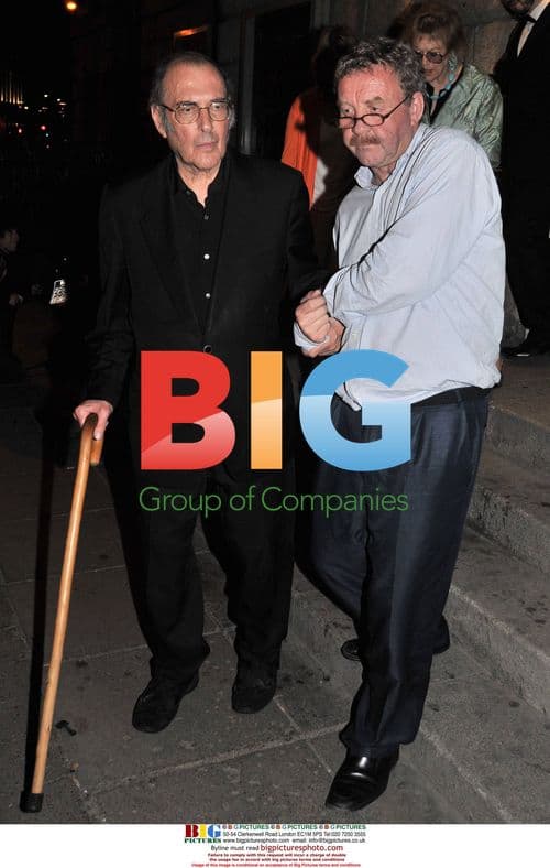 Harold Pinter and Michael Colgan leaving The Gate Theatre