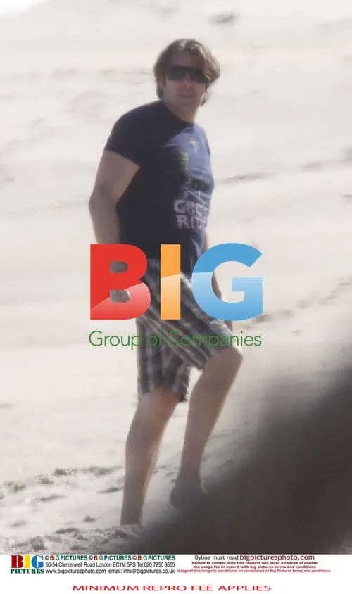 Jonathan Ross Relaxes on the Beach