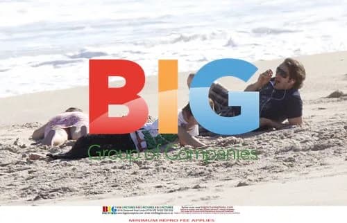 Jonathan Ross Relaxes on the Beach