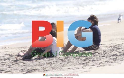 Jonathan Ross Relaxes on Beach