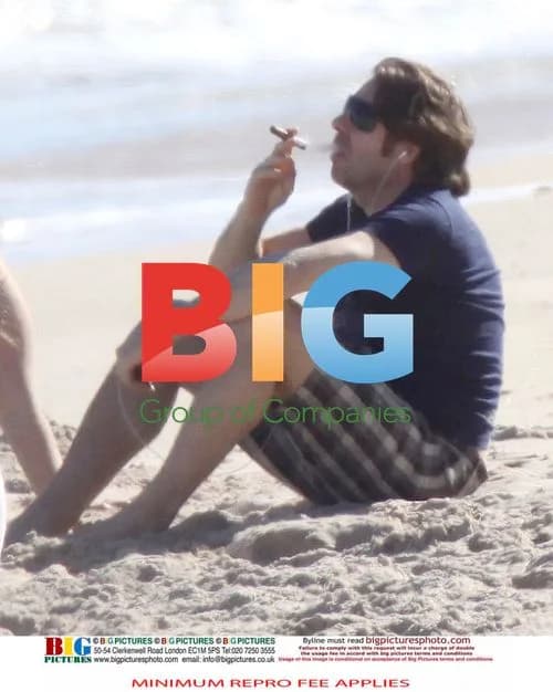 Jonathan Ross Relaxes on the Beach