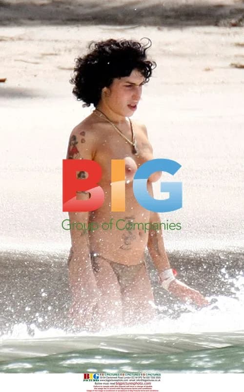 Amy Winehouse with mystery man in Caribbean