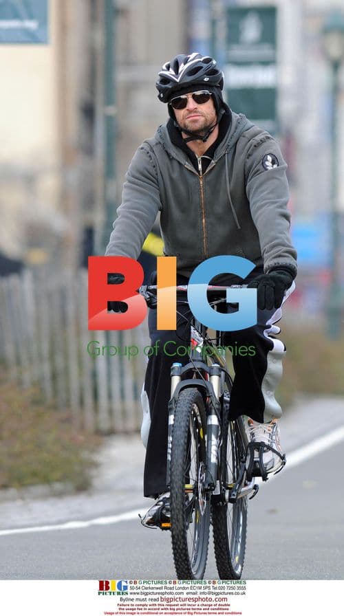 Hugh Jackman and son Oscar visit playground