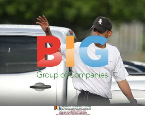 Obama Waves After Workout in Hawaii