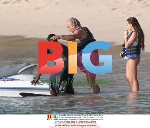 Phil Green takes a spill on jet ski with daughter