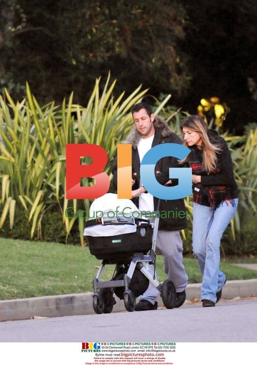 Adam Sandler and family out for a walk