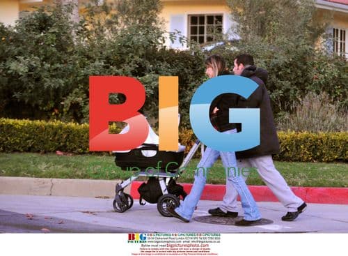 Adam Sandler with wife and baby