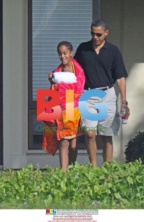 Barack Obama and Malia on Christmas Eve in Hawaii