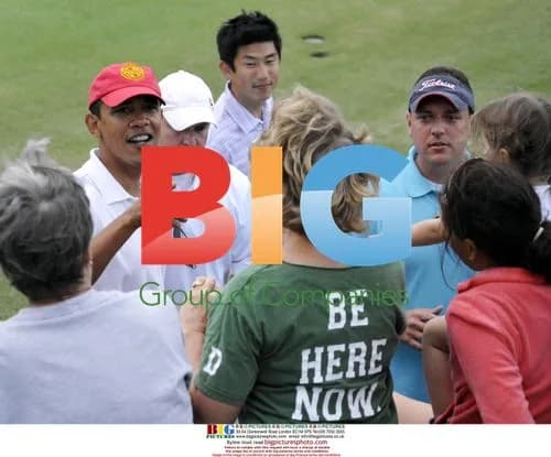 Obama Smiles, Shakes Hands After Golfing
