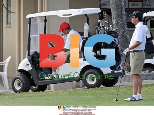 Barack Obama eats sandwich after golfing