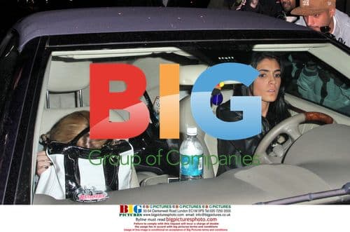 Lindsay Lohan Slinks Out of Villa Lounge