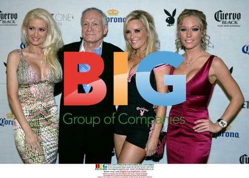 Hugh Hefner with Playmates at Playboy Party