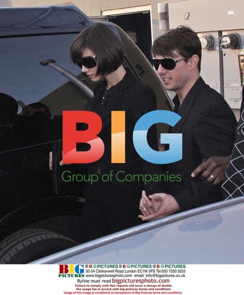 Tom Cruise and Katie Holmes Leave Restaurant