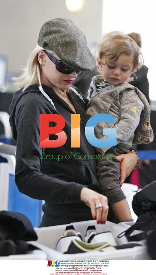 Gwen Stefani Departs LAX with Son and Assistants