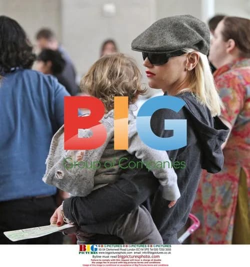 Gwen Stefani departs LAX with family