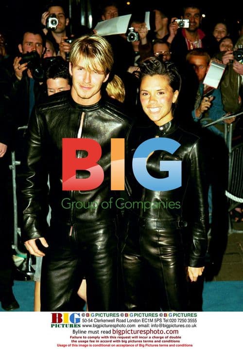 Beckham and Posh Arrive at Versace Event