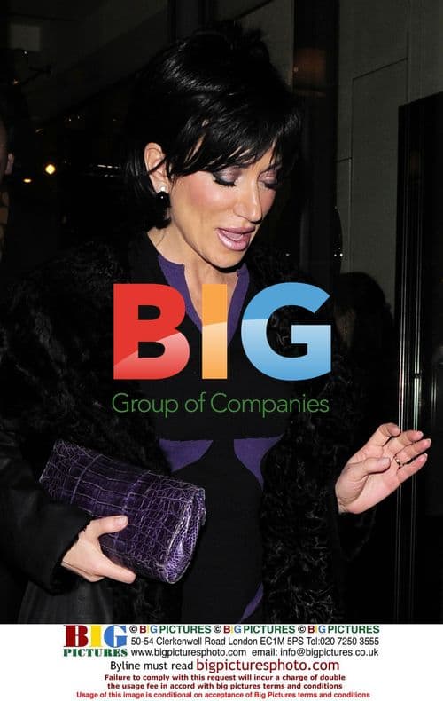 Nancy Dell Olio out with mystery man