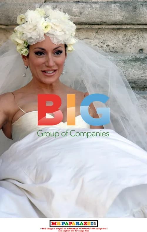 Nancy Dell'Olio poses in wedding dresses for magazine