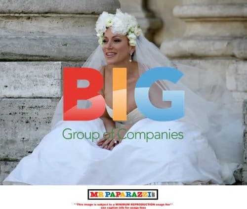 Nancy Dell'Olio Poses in Wedding Dresses