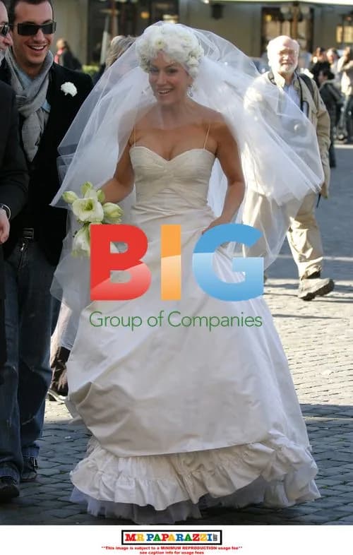Nancy Dell'Olio Poses in Wedding Dresses