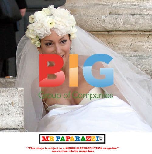 Nancy Dell'Olio Poses in Wedding Dresses