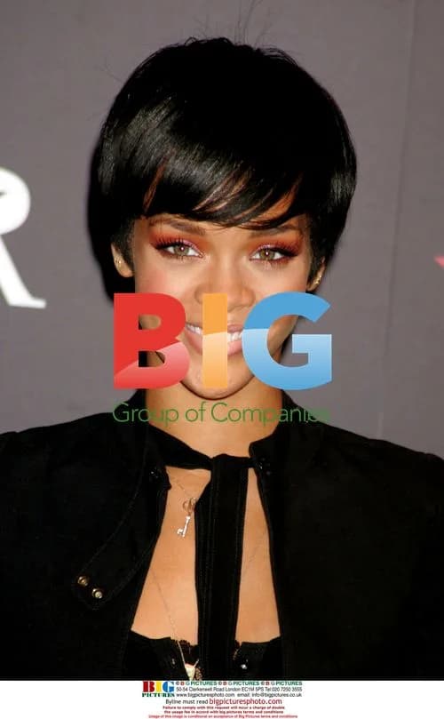 Rihanna Promotes Umbrella Collection