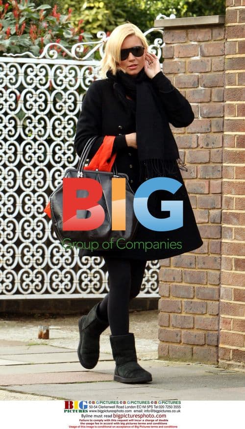 Denise van Outen returns home from shopping