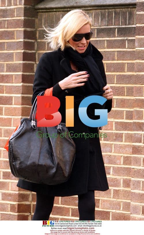 Denise van Outen returning home after shopping